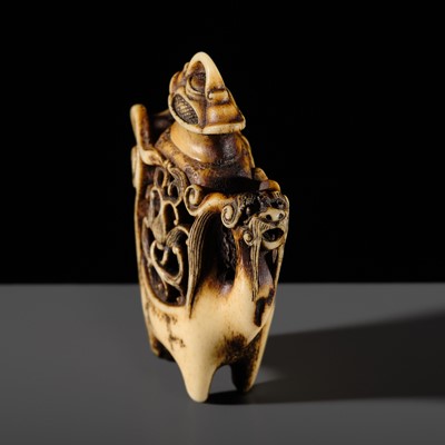 Lot 315 - HOSHUNSAI MASAYUKI: A SUPERB ANTLER NETSUKE OF A ZOOMORPHIC EWER