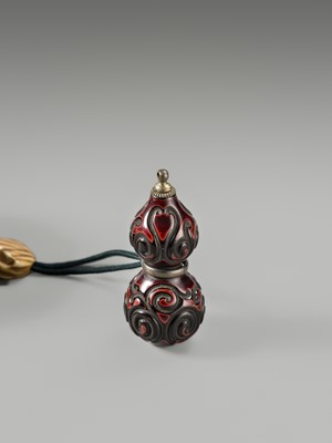 Lot 45 - HORAKU: A RARE LACQUER, METAL AND EBONY WOOD TONKOTSU