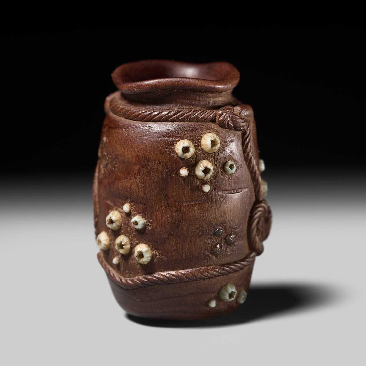 Lot 280 - YOSHIHIDE: A SUPERB AND RARE INLAID WOOD ‘TAKO-TSUBO’ NETSUKE