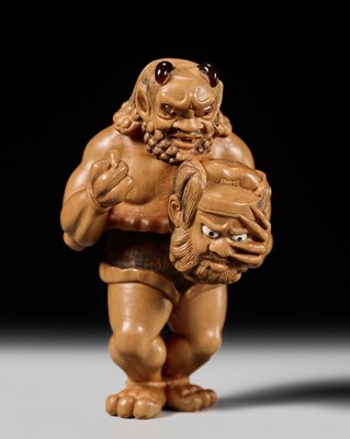 Lot 372 - HIDEYUKI: A CONTEMPORARY WOOD NETSUKE OF AN ONI TRIUMPHING OVER SHOKI