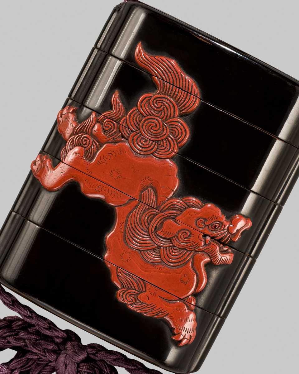 Lot 7 - YOZEI: A FOUR-CASE TSUISHU-INLAID LACQUER INRO DEPICTING SHISHI AND PEONY