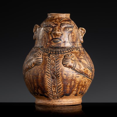 Lot 162 - A SAWANKHALOK HUMANOID BROWN GLAZED STONEWARE JAR