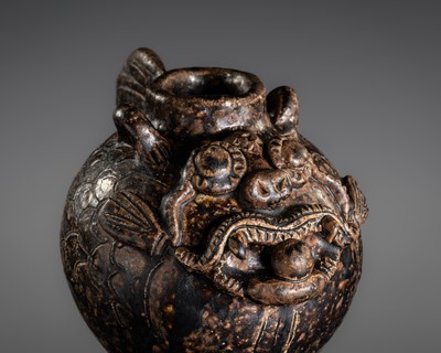 Lot 150 - A RARE DARK BROWN GLAZED STONEWARE ‘FISH’ WATERPOT, SAWANKHALOK