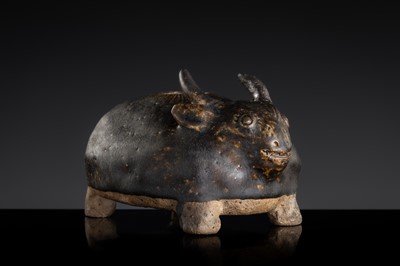 A RARE DARK-BROWN GLAZED STONEWARE ‘OX’ LIME POT, ANGKOR PERIOD