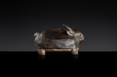 A RARE DARK-BROWN GLAZED STONEWARE ‘OX’ LIME POT, ANGKOR PERIOD