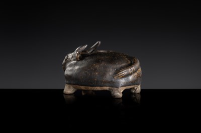 A RARE DARK-BROWN GLAZED STONEWARE ‘OX’ LIME POT, ANGKOR PERIOD