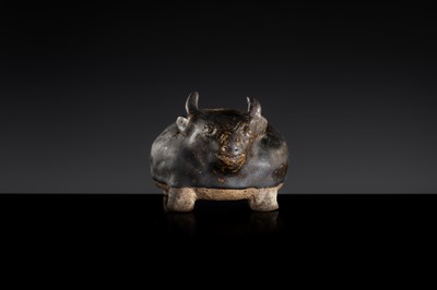 A RARE DARK-BROWN GLAZED STONEWARE ‘OX’ LIME POT, ANGKOR PERIOD