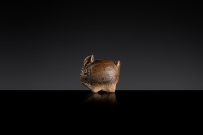 Lot 127 - A SMALL BROWN GLAZED STONEWARE ‘HARE’ LIME POT, ANGKOR PERIOD