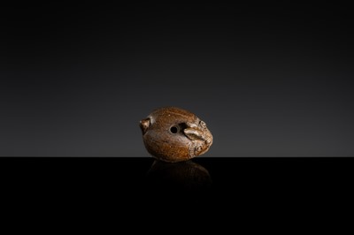 Lot 127 - A SMALL BROWN GLAZED STONEWARE ‘HARE’ LIME POT, ANGKOR PERIOD