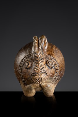 Lot 127 - A SMALL BROWN GLAZED STONEWARE ‘HARE’ LIME POT, ANGKOR PERIOD
