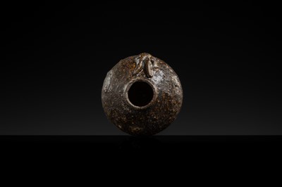 A DARK BROWN GLAZED STONEWARE ‘RABBIT’ LIME POT, ANGKOR PERIOD