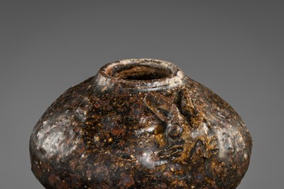 A DARK BROWN GLAZED STONEWARE ‘RABBIT’ LIME POT, ANGKOR PERIOD