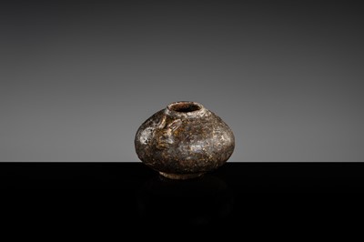A DARK BROWN GLAZED STONEWARE ‘RABBIT’ LIME POT, ANGKOR PERIOD