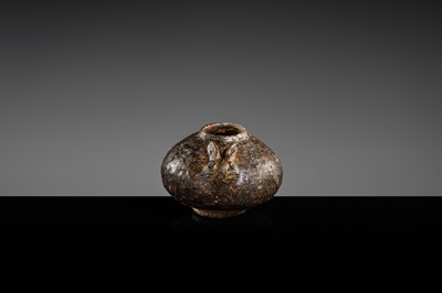 A DARK BROWN GLAZED STONEWARE ‘RABBIT’ LIME POT, ANGKOR PERIOD