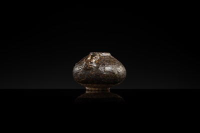 A DARK BROWN GLAZED STONEWARE ‘RABBIT’ LIME POT, ANGKOR PERIOD