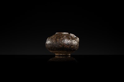 A DARK BROWN GLAZED STONEWARE ‘RABBIT’ LIME POT, ANGKOR PERIOD
