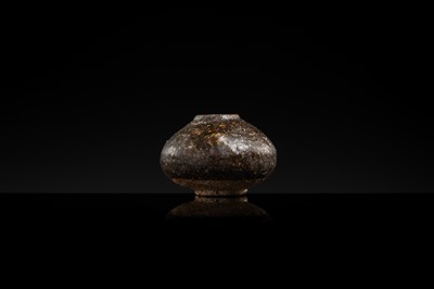A DARK BROWN GLAZED STONEWARE ‘RABBIT’ LIME POT, ANGKOR PERIOD