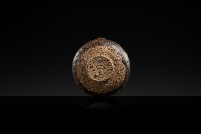 A DARK BROWN GLAZED STONEWARE ‘RABBIT’ LIME POT, ANGKOR PERIOD