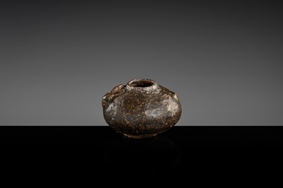 A DARK BROWN GLAZED STONEWARE ‘RABBIT’ LIME POT, ANGKOR PERIOD