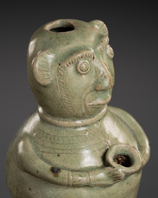 Lot 158 - AN ANTHROPOMORPHIC CELADON GLAZED STONEWARE POURING VESSEL, SAWANKHALOK