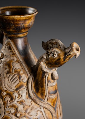 Lot 163 - A SAWANKHALOK BROWN-GLAZED STONEWARE DRAGON EWER, 17TH–18TH CENTURY