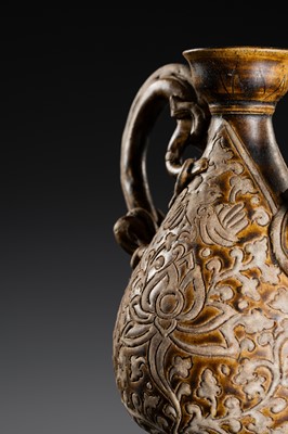 A SAWANKHALOK BROWN-GLAZED STONEWARE DRAGON EWER, 17TH–18TH CENTURY