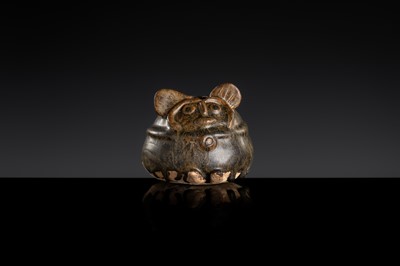 A DARK-BROWN GLAZED STONEWARE ‘RODENT’ LIME POT, ANGKOR PERIOD