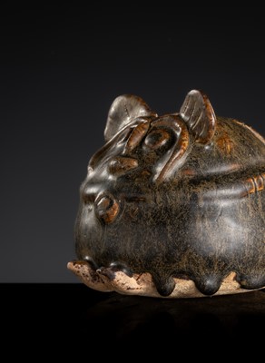 A DARK-BROWN GLAZED STONEWARE ‘RODENT’ LIME POT, ANGKOR PERIOD