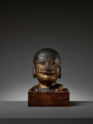 Lot 466 - A GILT-LACQUERED WOOD HEAD OF BUDAI, MING