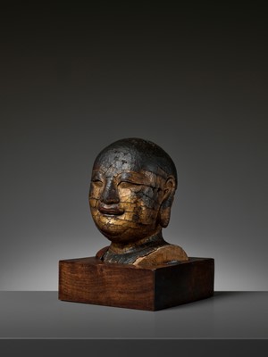 Lot 466 - A GILT-LACQUERED WOOD HEAD OF BUDAI, MING