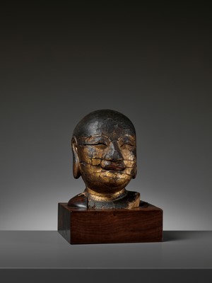 Lot 466 - A GILT-LACQUERED WOOD HEAD OF BUDAI, MING