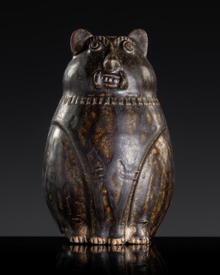 Lot 138 - A DARK-BROWN GLAZED STONEWARE ‘BEAR’ LIME POT, ANGKOR PERIOD