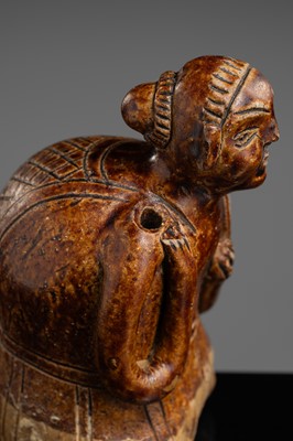 A SAWANKHALOK STONEWARE JOS STICK HOLDER IN SHAPE OF A MAN, 15TH–16TH CENTURY