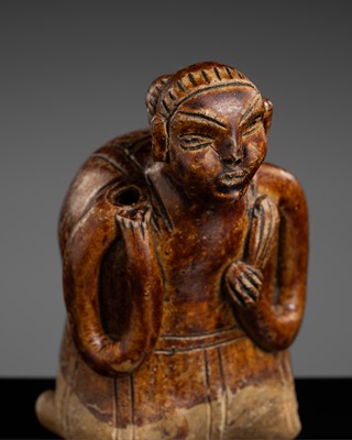 Lot 151 - A SAWANKHALOK STONEWARE JOS STICK HOLDER IN SHAPE OF A MAN, 15TH–16TH CENTURY