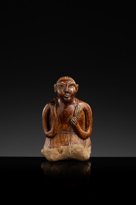 A SAWANKHALOK STONEWARE JOS STICK HOLDER IN SHAPE OF A MAN, 15TH–16TH CENTURY