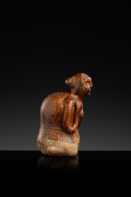 A SAWANKHALOK STONEWARE JOS STICK HOLDER IN SHAPE OF A MAN, 15TH–16TH CENTURY