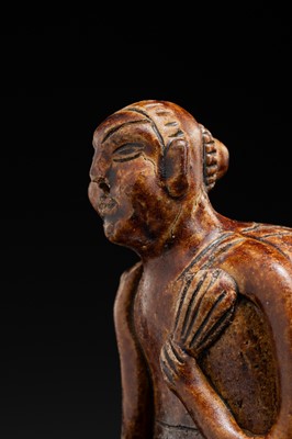A SAWANKHALOK STONEWARE JOS STICK HOLDER IN SHAPE OF A MAN, 15TH–16TH CENTURY