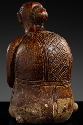 A SAWANKHALOK STONEWARE JOS STICK HOLDER IN SHAPE OF A MAN, 15TH–16TH CENTURY