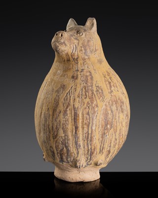 Lot 140 - A BROWN GLAZED STONEWARE ‘BEAR’ LIME POT, ANGKOR PERIOD