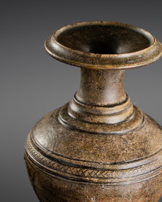 Lot 142 - A DARK BROWN GLAZED STONEWARE BALUSTER JAR, ANGKOR PERIOD