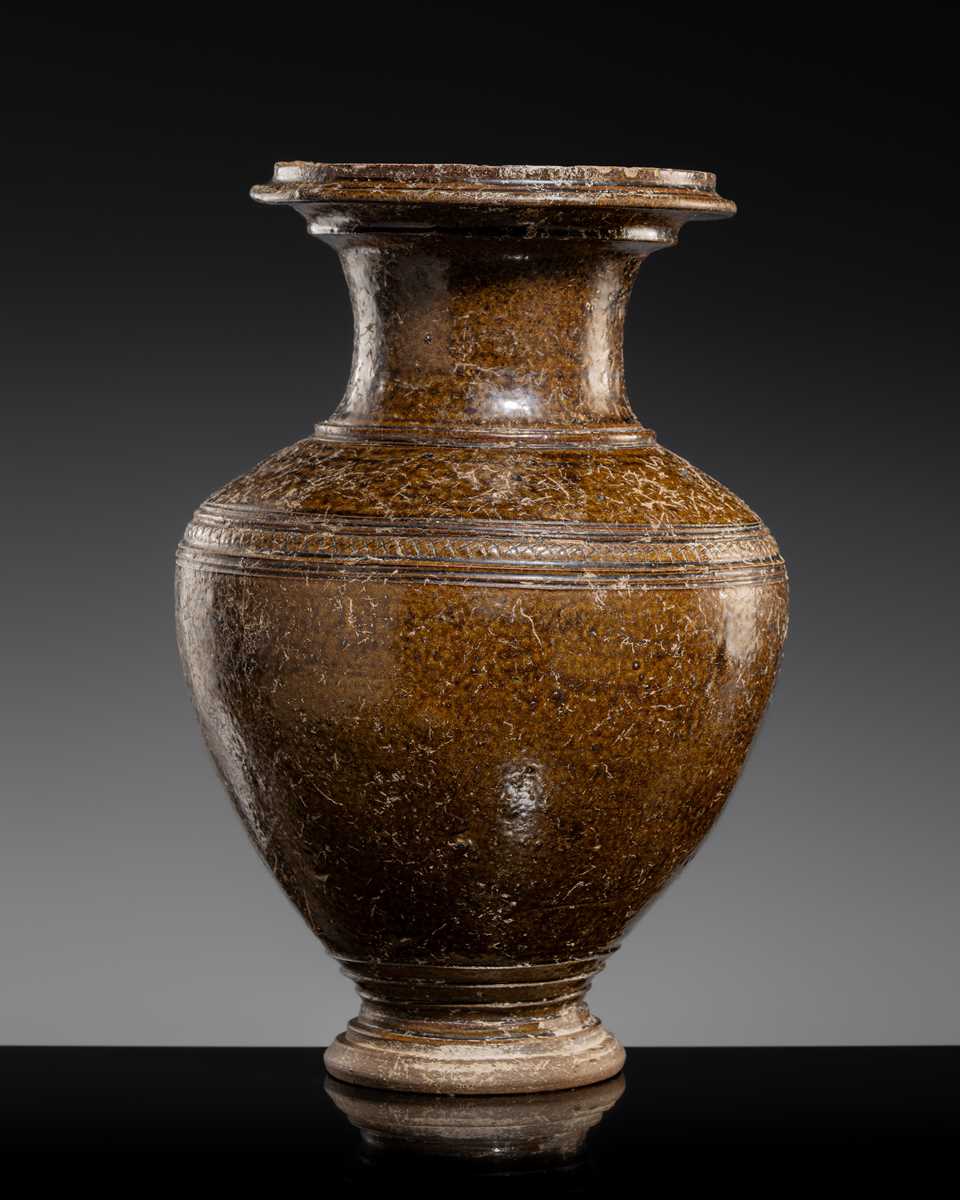 Lot 143 - A LARGE DARK BROWN GLAZED STONEWARE BALUSTER JAR, ANGKOR PERIOD