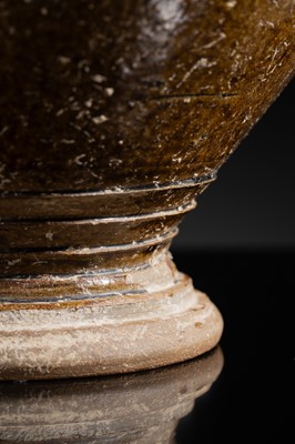 Lot 143 - A LARGE DARK BROWN GLAZED STONEWARE BALUSTER JAR, ANGKOR PERIOD