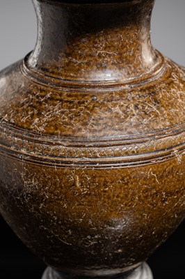 Lot 143 - A LARGE DARK BROWN GLAZED STONEWARE BALUSTER JAR, ANGKOR PERIOD