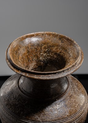 Lot 143 - A LARGE DARK BROWN GLAZED STONEWARE BALUSTER JAR, ANGKOR PERIOD