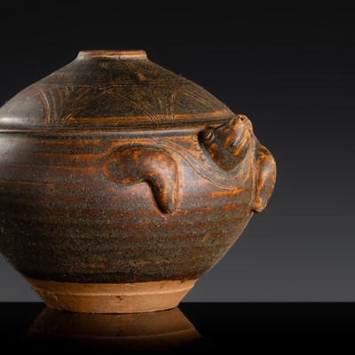 Lot 148 - A KHMER STYLE DARK BROWN GLAZED STONEWARE JAR IN THE FORM OF A TORTOISE