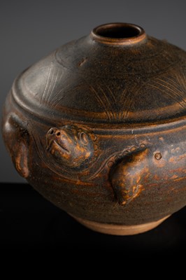 A KHMER STYLE DARK BROWN GLAZED STONEWARE JAR IN THE FORM OF A TORTOISE