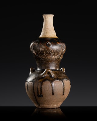 Lot 137 - A DARK BROWN GLAZED STONEWARE GOURD BOTTLE, ANGKOR PERIOD