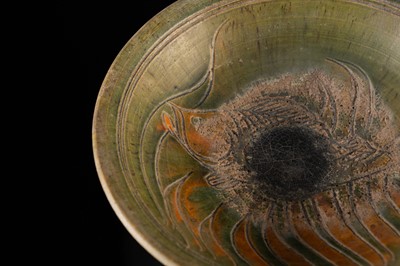 A THAI GREEN & AMBER GLAZED CERAMIC DISH WITH CARP