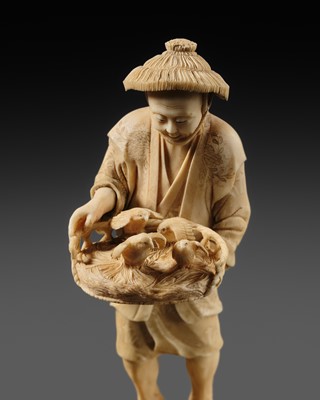 Lot 414 - TOKYOKU: AN IVORY OKIMONO OF A FARMER