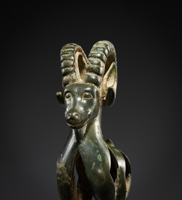 Lot 118 - AN ‘IBEX’ BRONZE FINIAL, SOUTHERN SIBERIA, 6TH – 5TH CENTURY BC